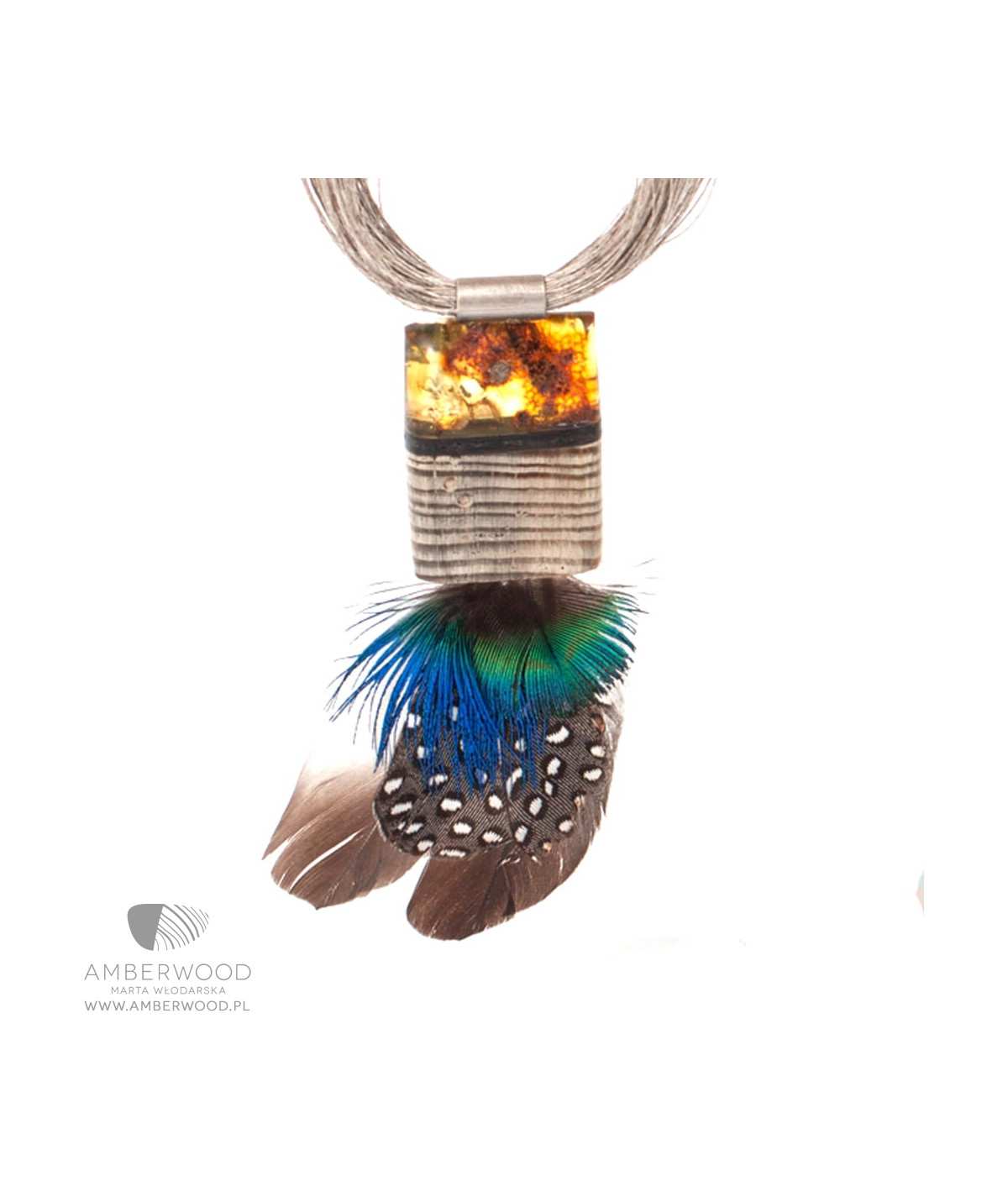 Necklace made of amber, wood, silver and feathers.