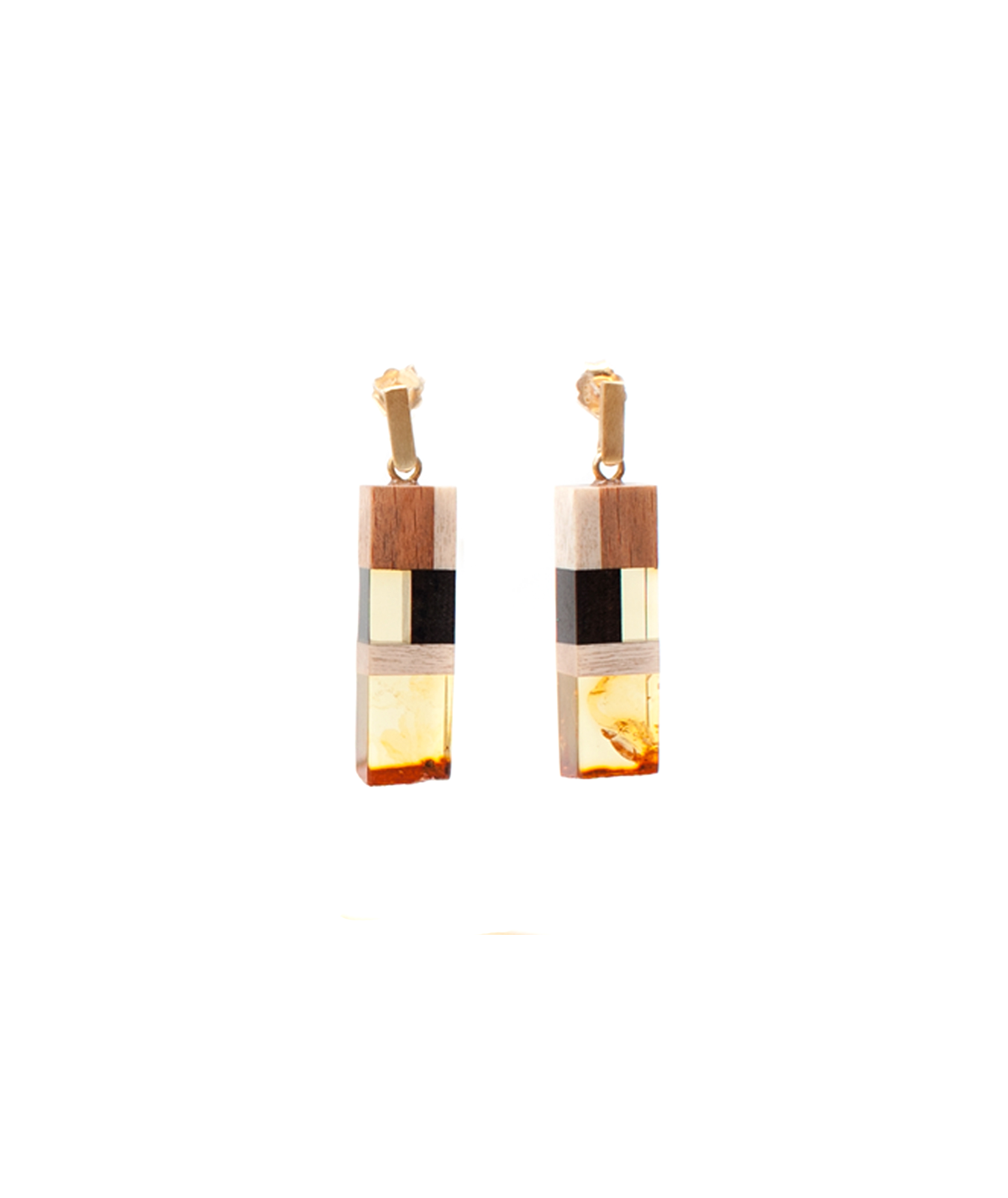 Earrings made of amber and wood on gold plated hooks.