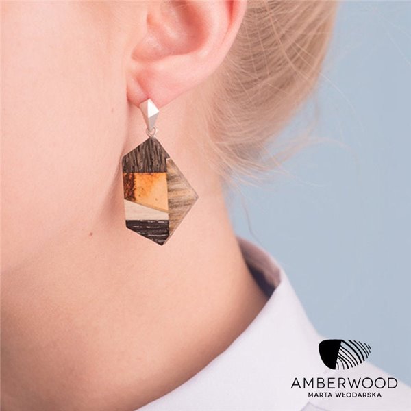 Earrings made of amber and wood on silver hooks.