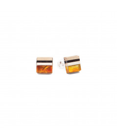 Studs from Simple Collection, made of natural orange amber, wood and Sterling silver.